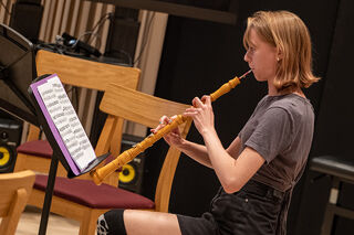 Woman playing oboe