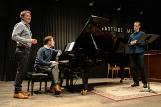 Singer, pianist and adjudicator on stage of Eastside Jazz Club