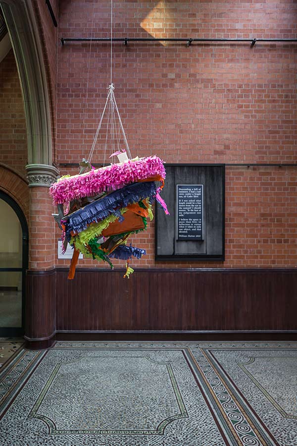 Margaret Street Atrium with large piñata type sculpture hanging from ceiling