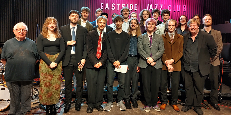 Group picture of RBC Jazz orchestra with Nathan Tomas, winner of Mike Gibbs Prize 