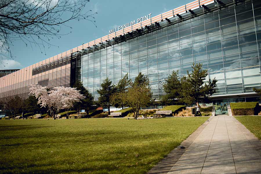 Millennium point building with grass outside