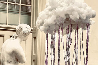 statue and cloud