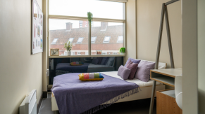 A bed in a bedroom