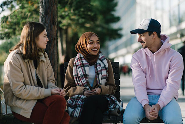 Students sitting on a bench