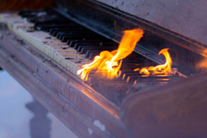 A burning piano