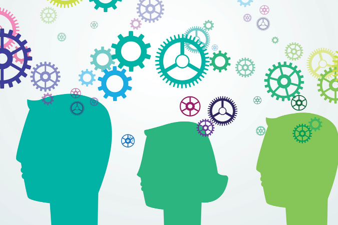 Outline of people's faces with cogs above