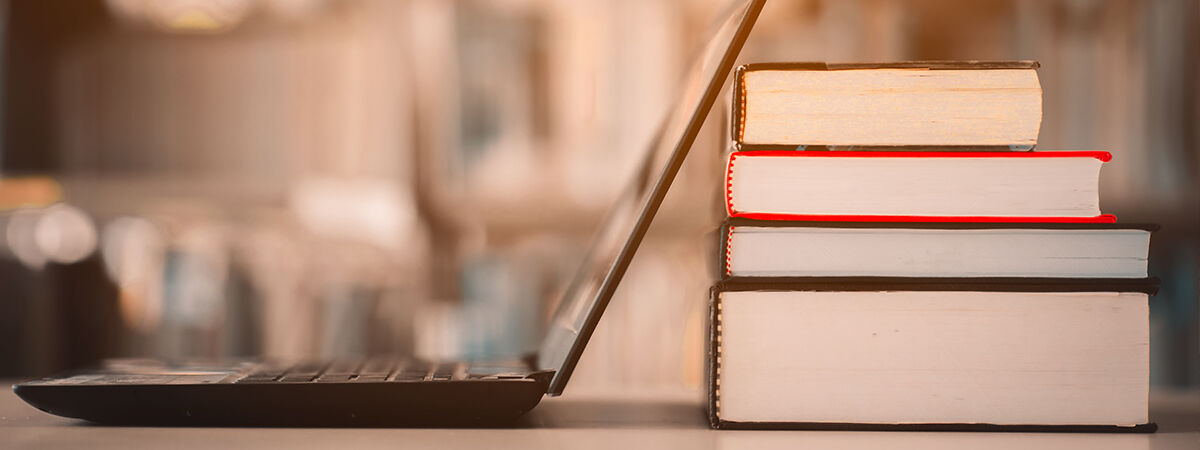 Books and a laptop