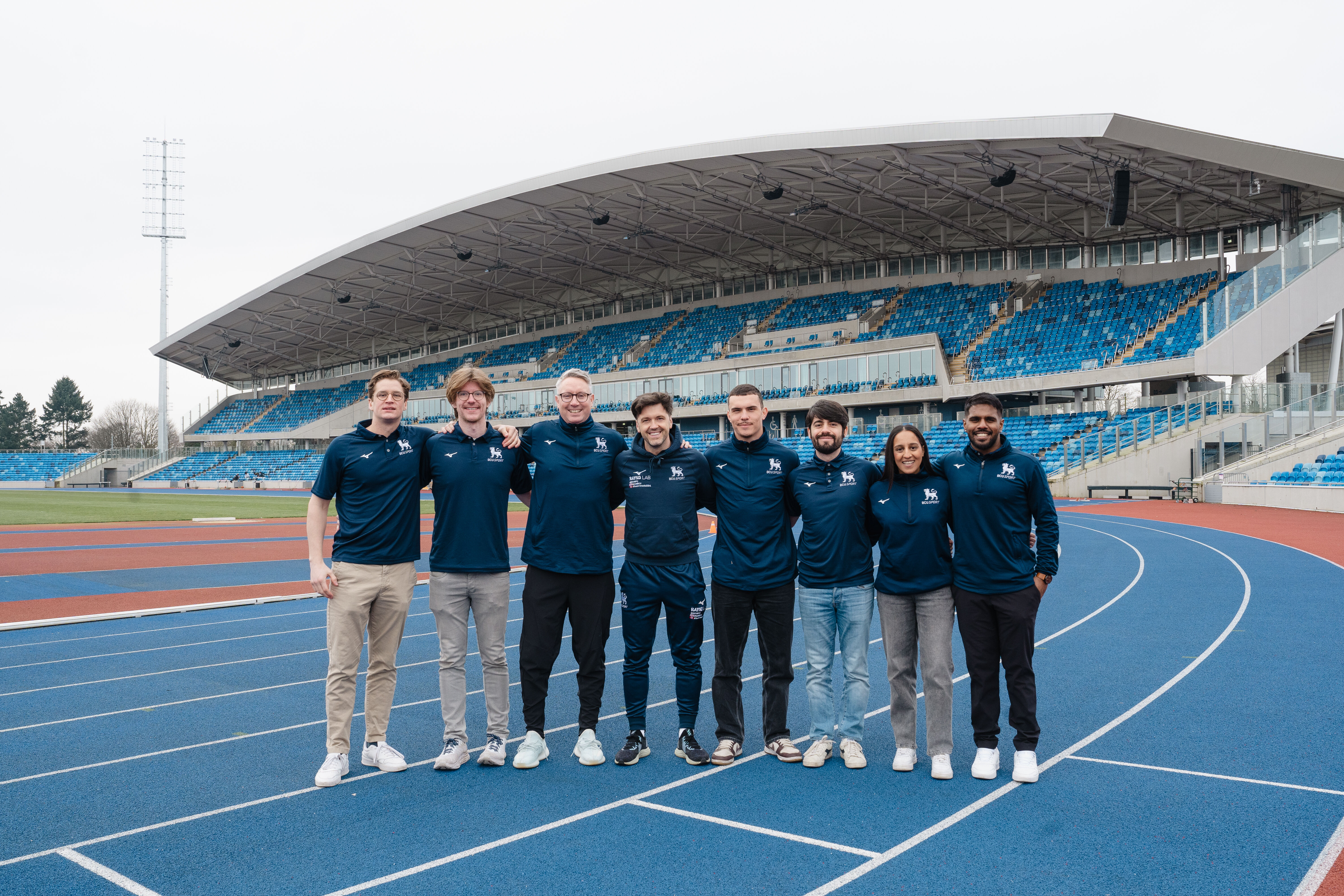 Footballers high fiving 