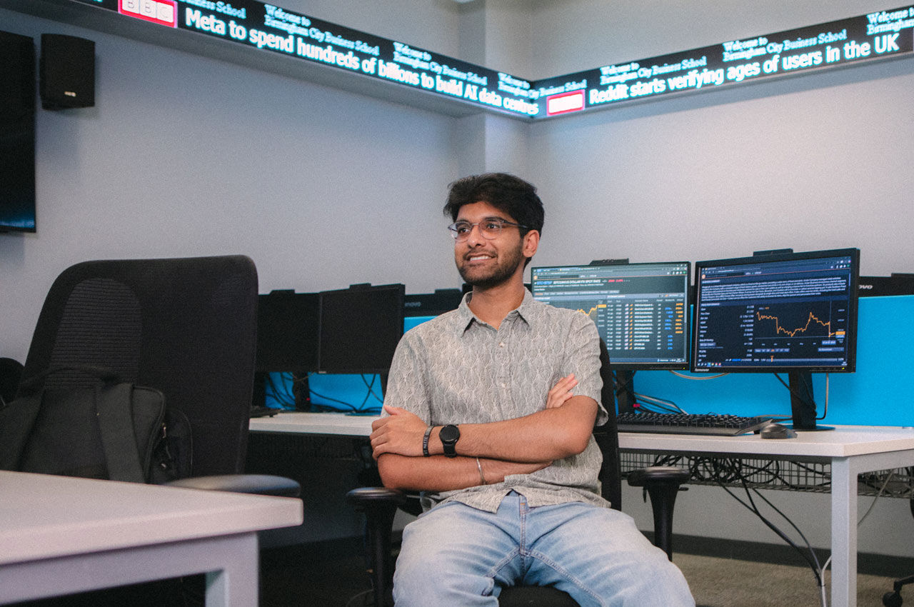 Business students work in the City Trading Room