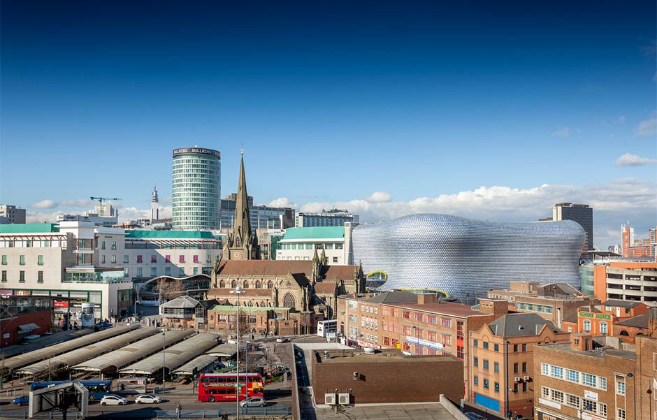 Birmingham skyline on a sunny day, featuring the Bullring and church