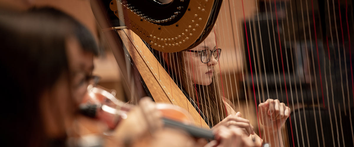 Junior Conservatoire student playing harp