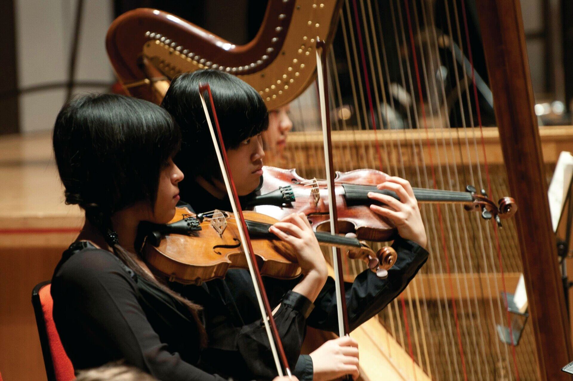 RBC students and CBSO playing together - two violinists