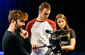 Students using camera equipment