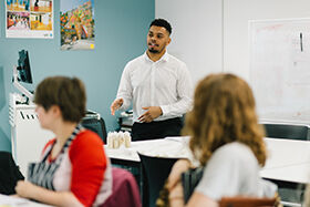 Teacher talking to classroom 