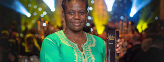 Imogeen Denton of BCU with the award for Excellence in Diversity and Inclusion at the Signature Awards.