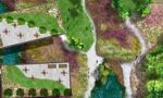 A top-down view of buildings surrounded by grass