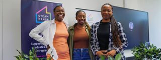 Three of the student entrepreneurs currently using the STEAMhouse Pre-Incubator facility.