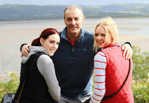Lizzie and Charlotte with dad Paul in Aberdovey