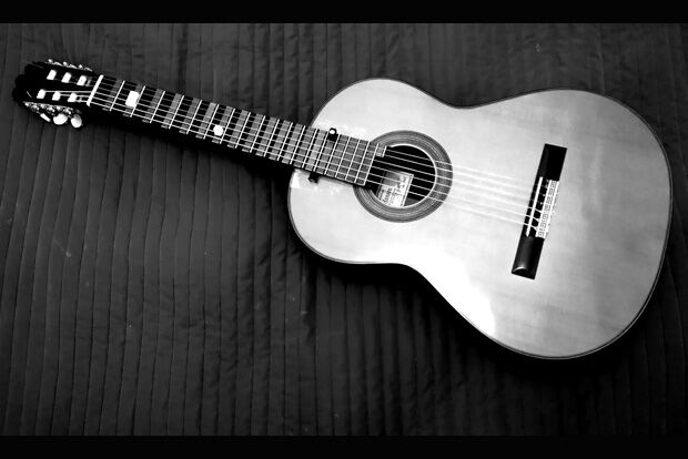 Black and white photo of classical guitar