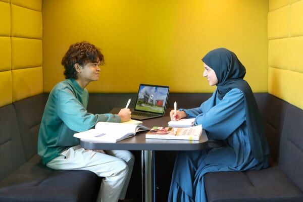 Students in a study pod