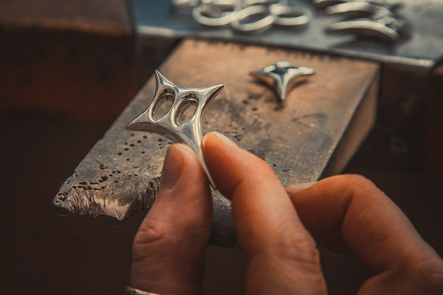 Student creating a broach
