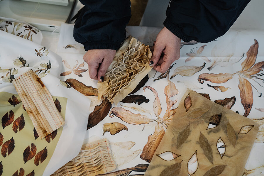 Textile design patterns with  someones hands 