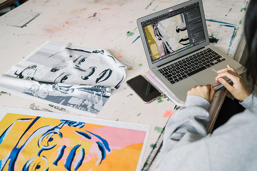 Laptop and pictures of textile design