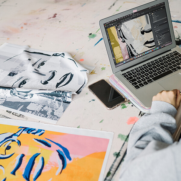Laptop and pictures of textile design