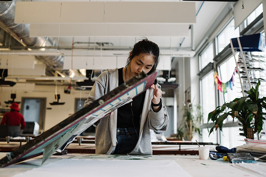 student using copy machine