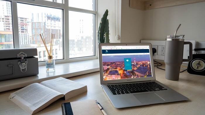A laptop screen showing accommodation portal