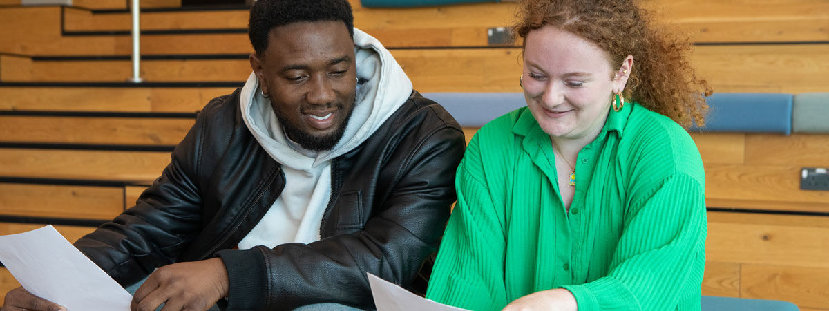 Two students look at their exam results