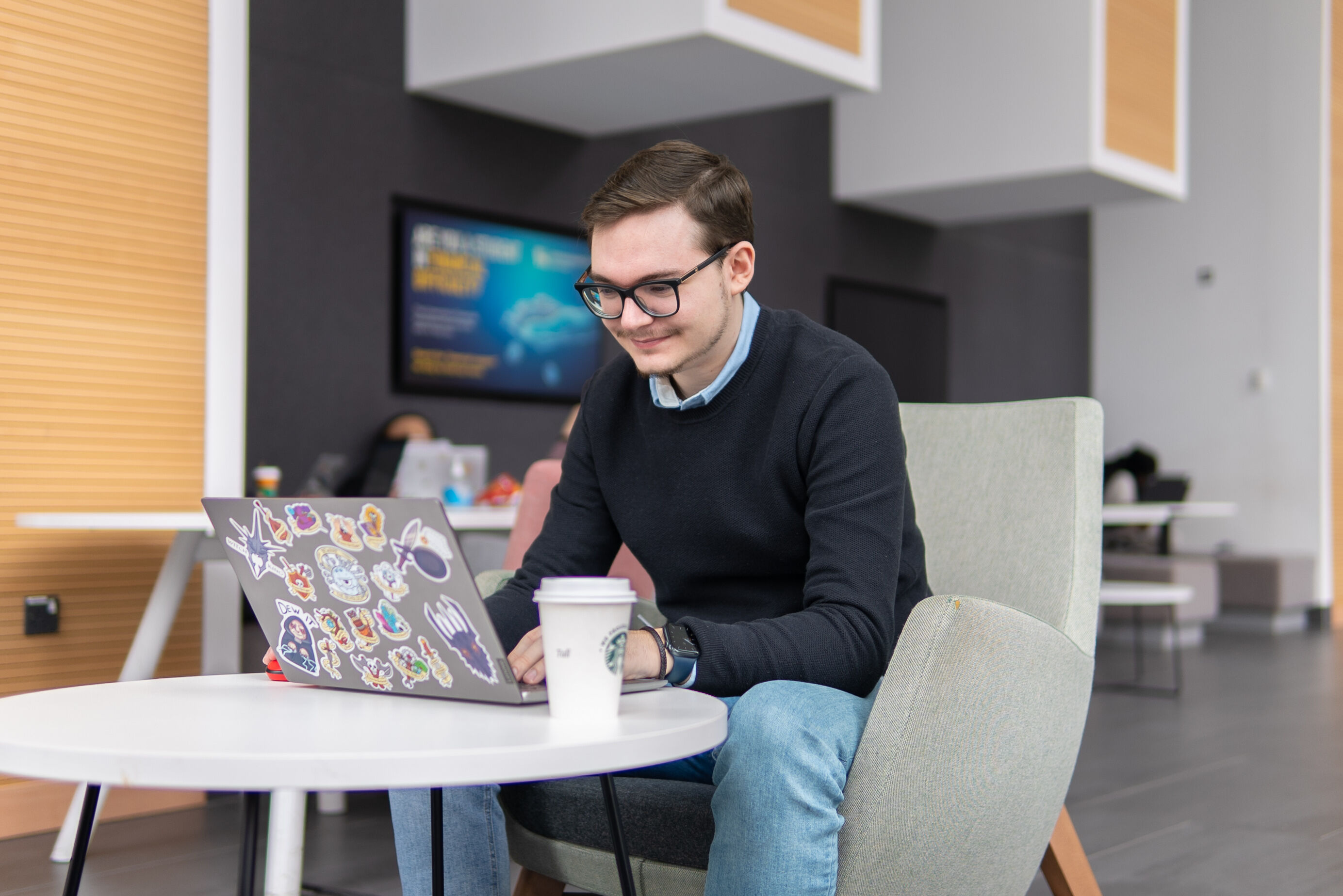 Student searching for a course on his laptop
