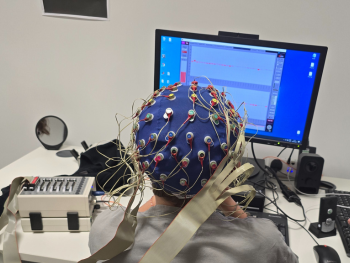 Child wearing EEG cap