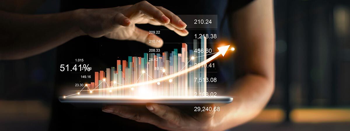 What Get Measured 1200x450 - Man holding an iPad with data
