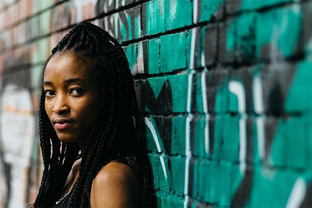 Why Black Studies Matters 619x412 - Woman stood against graffiti wall