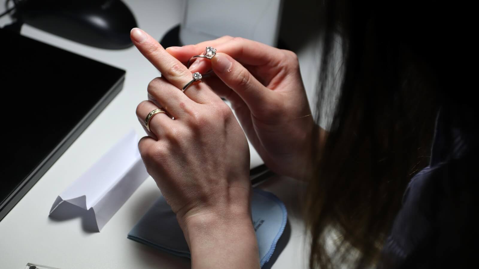 A person comparing rings