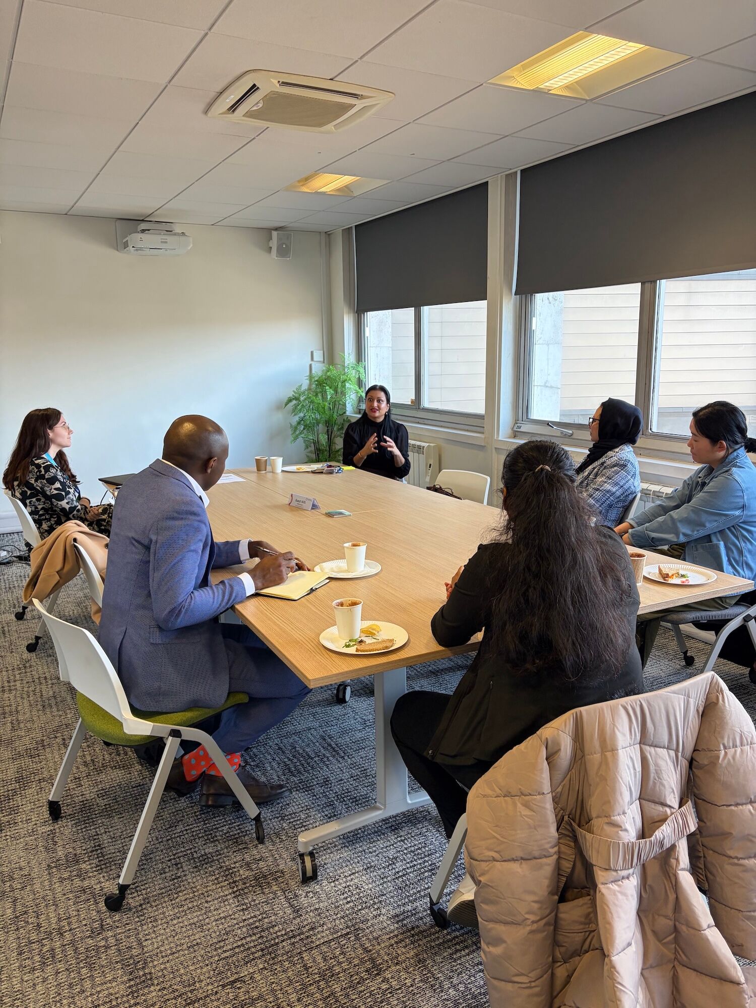 PGRs sat around a table