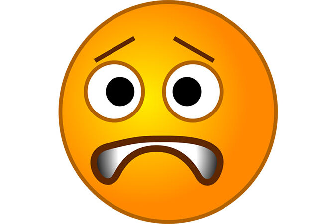 Image of a worried emoji face